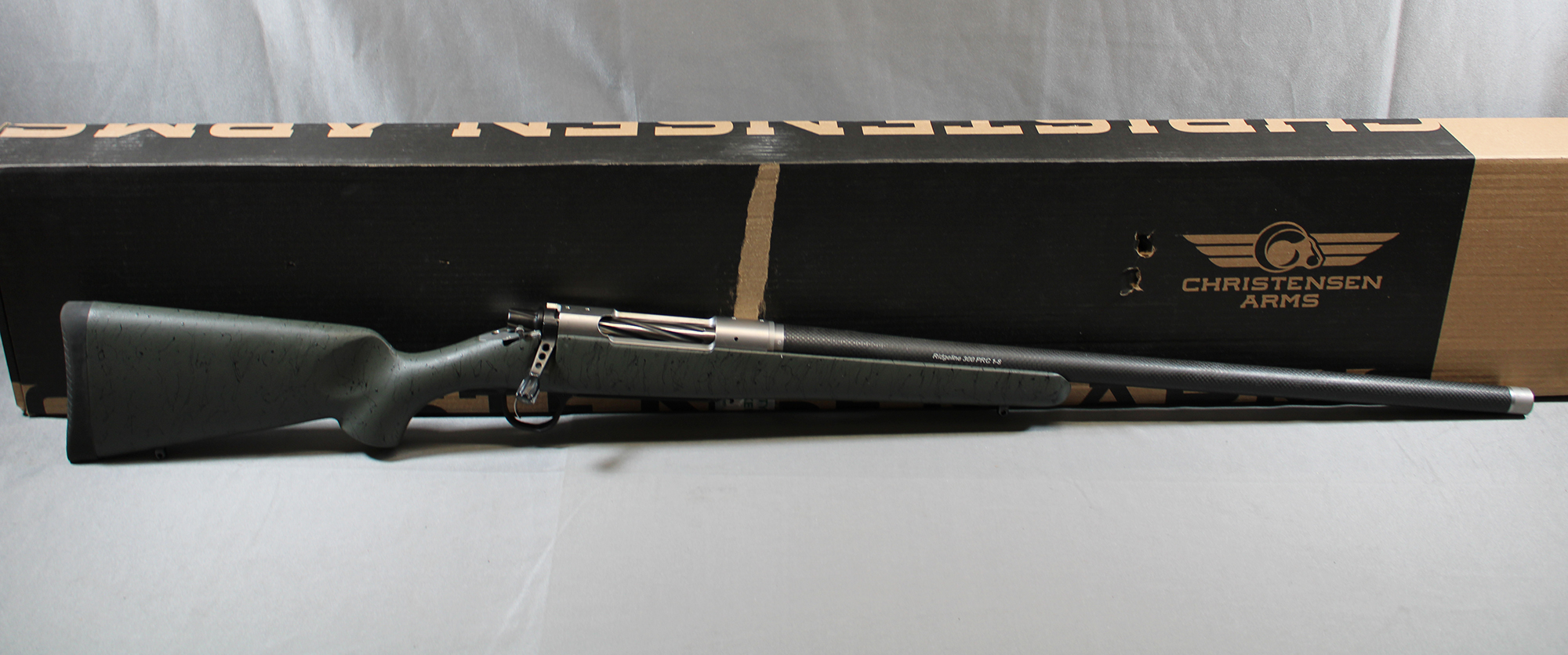 Christensen Arms Ridgeline Bolt-Action Rifle - .300 PRC - Carbon Fiber Wrapped - Green w/Black Webbing - Christensen Arms
