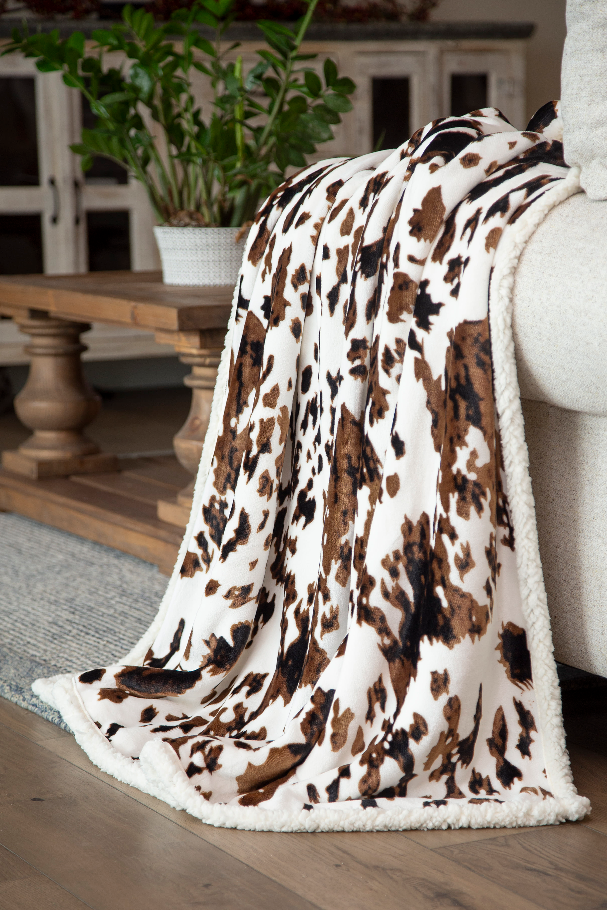 Image of Carstens, Inc. Tri-Color Cowhide Plush Sherpa Throw