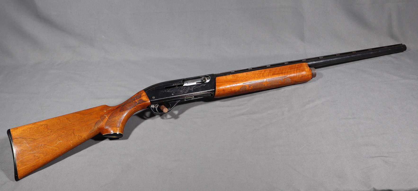 Remington~1100~12 Gauge - Remington
