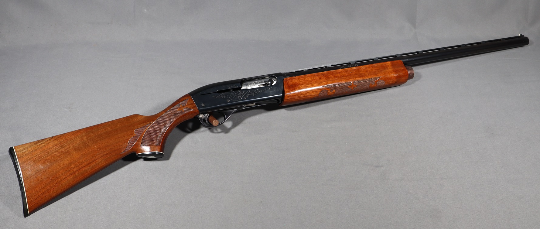 Remington~1100~12 Gauge - Remington