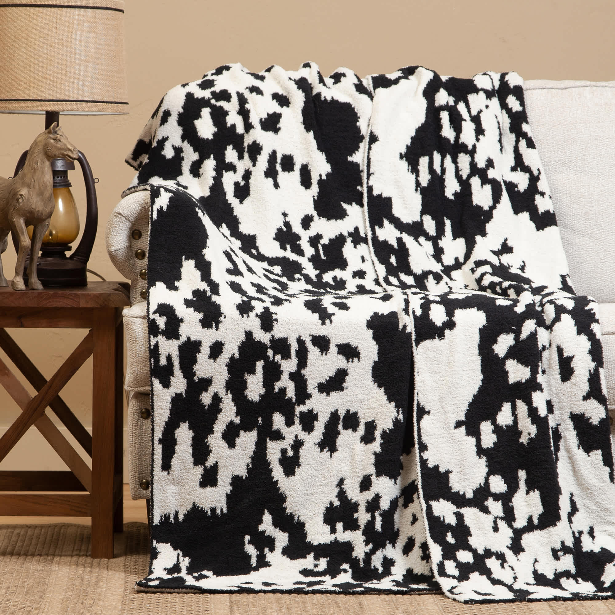 Image of Carstens, Inc. Stretchy Throw Blanket - Cowhide