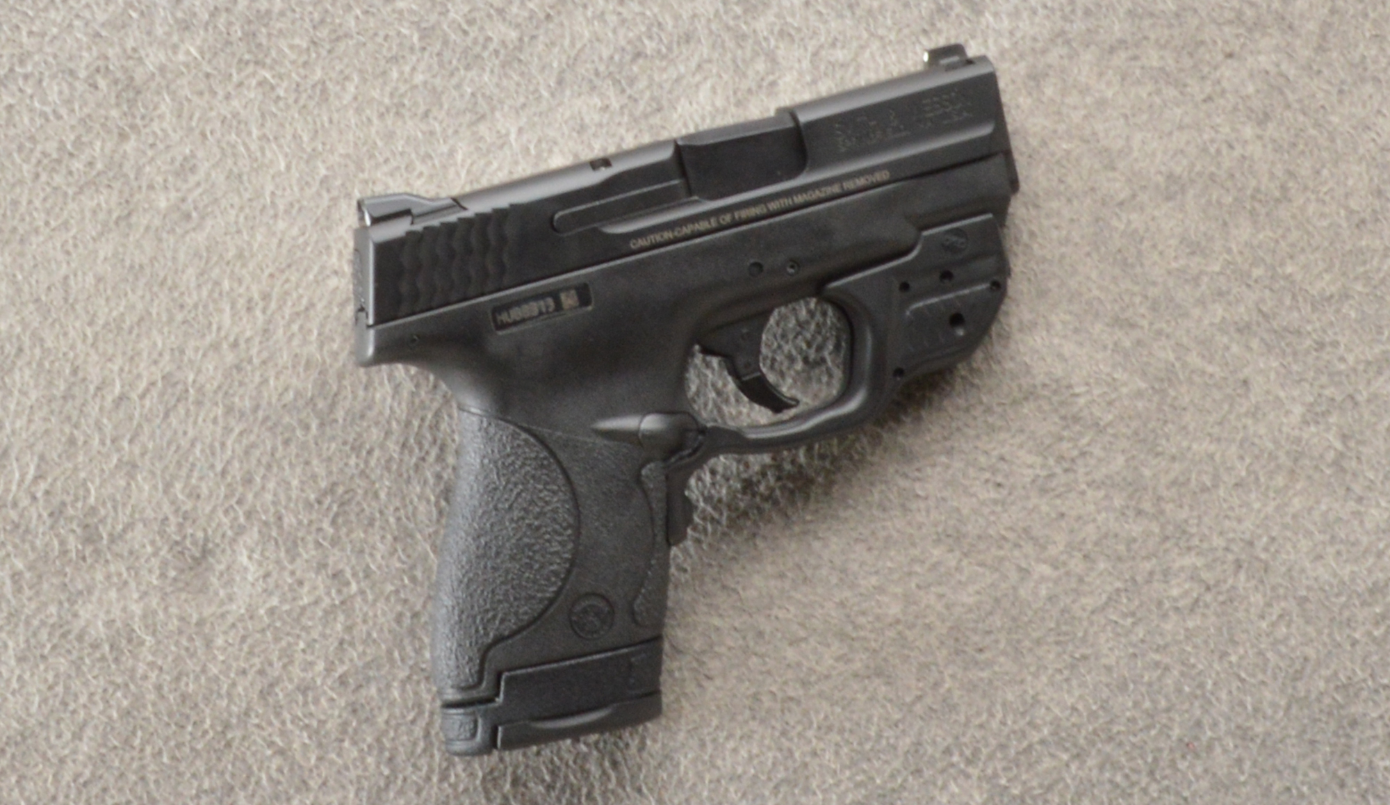 Image of Smith & Wesson ~ M&P9 Shield ~ 9mm Luger ~ Crimson Trace Green Laser