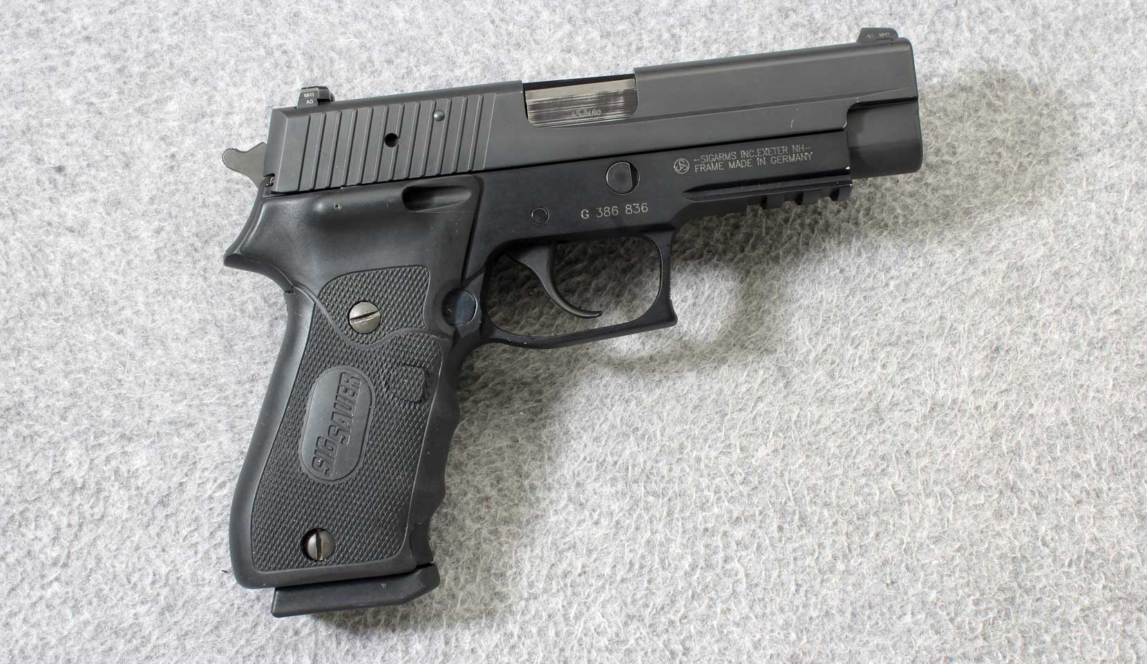 Image of Sig Sauer ~ P220 with Laser Grip ~ .45 ACP