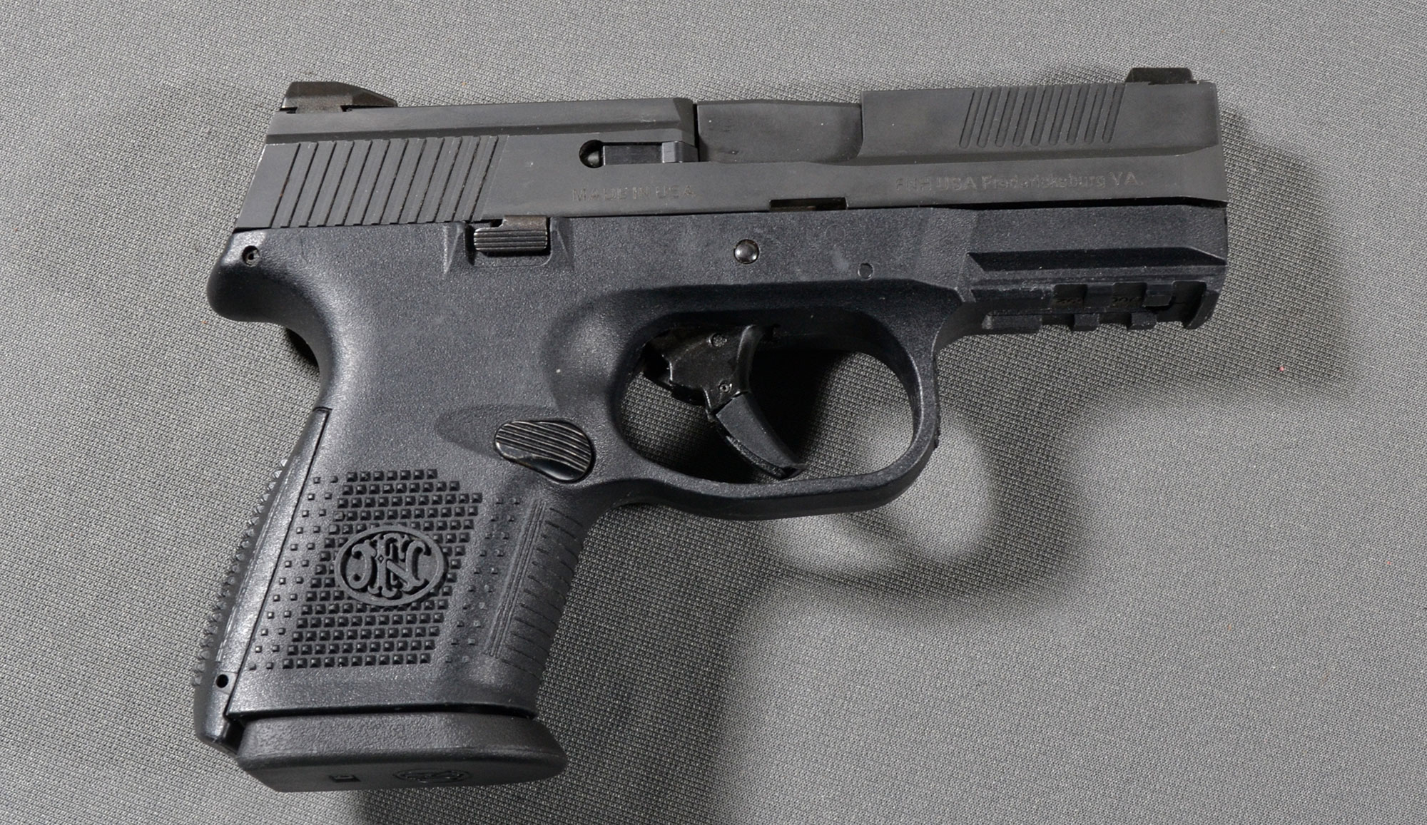 Image of FN ~ FNS-9C ~ 9mm Luger