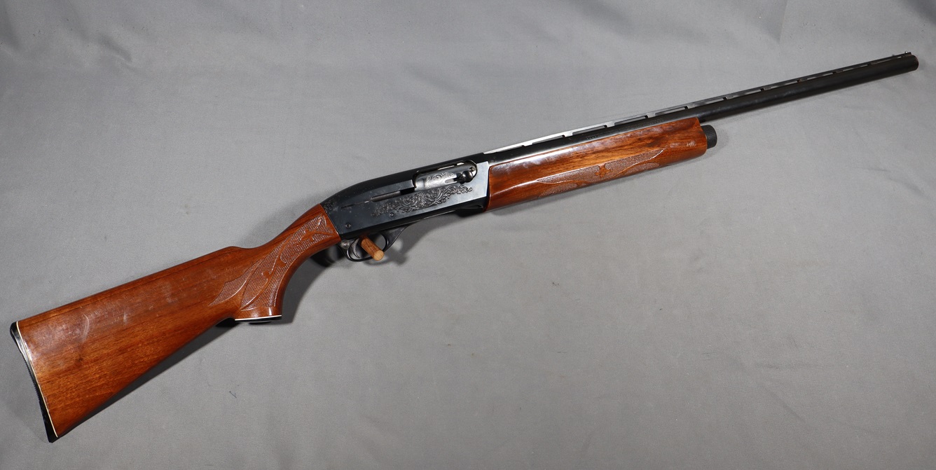 Remington~1100~12 Gauge - Remington