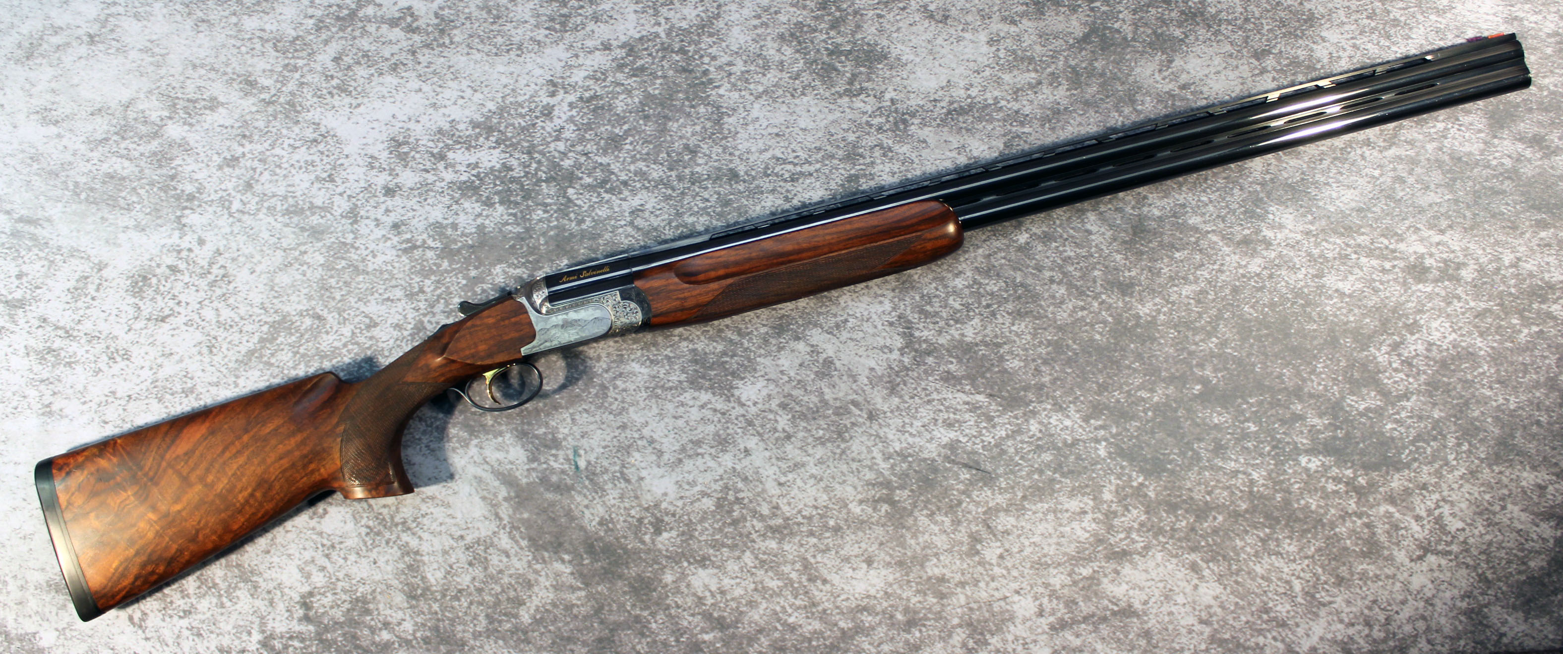 Armi Salvenelli ~ None ~ 12 Gauge