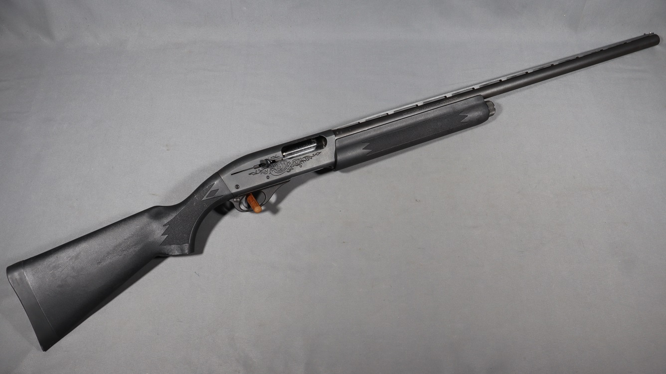 Remington~1100~12 Gauge - Remington