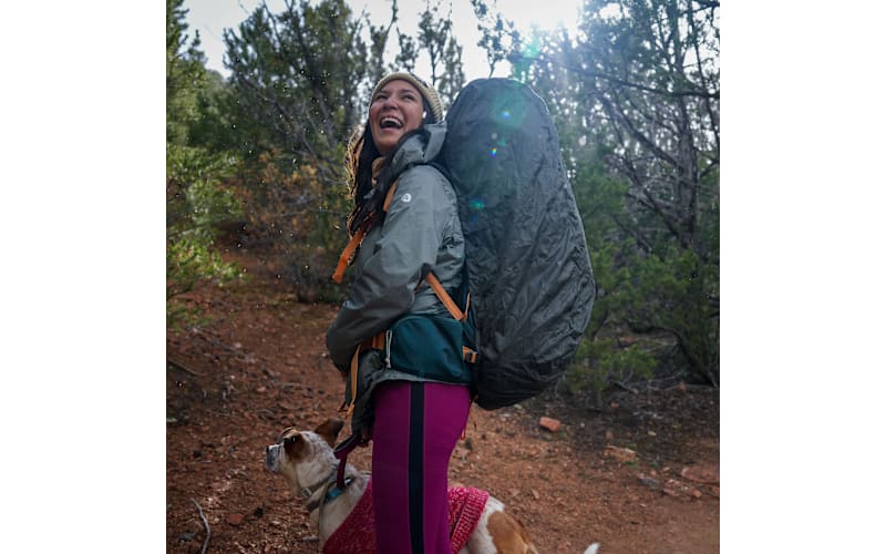 head hidding the back of kelty backpack Coyote 60-105 Liter Internal Frame medium for 30 50 liter packs Brand: Kelty | Pack Hacker