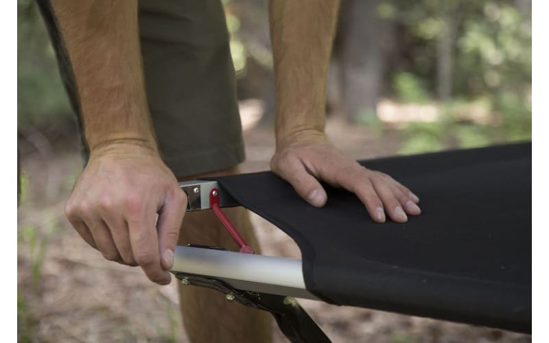 Cot top pivot arm