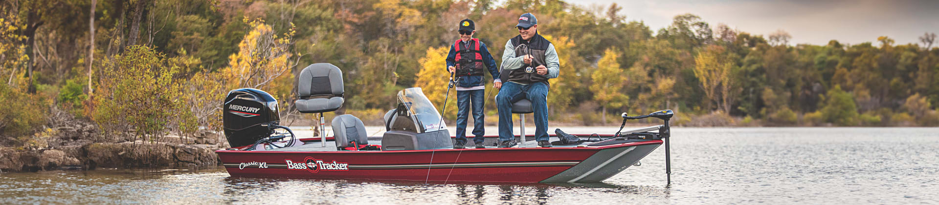 two men fishing from bass tracker boat