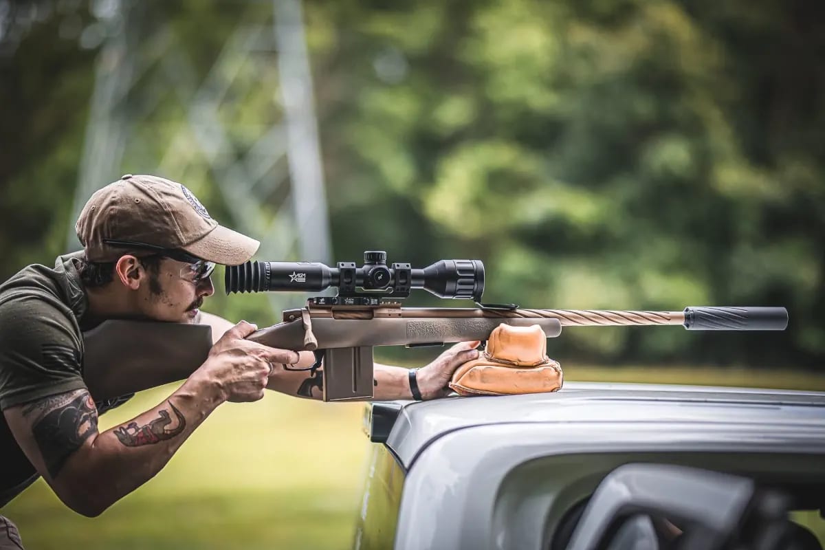 Rifle with suppressor attached