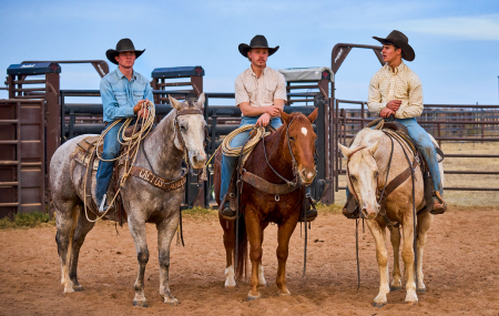 three men on horseback